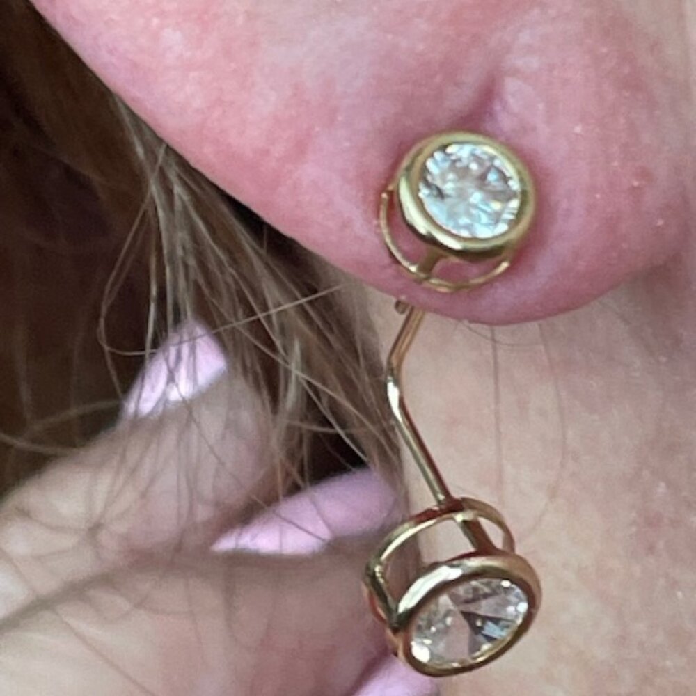 10K UMC pierced earrings with cubic zirconias